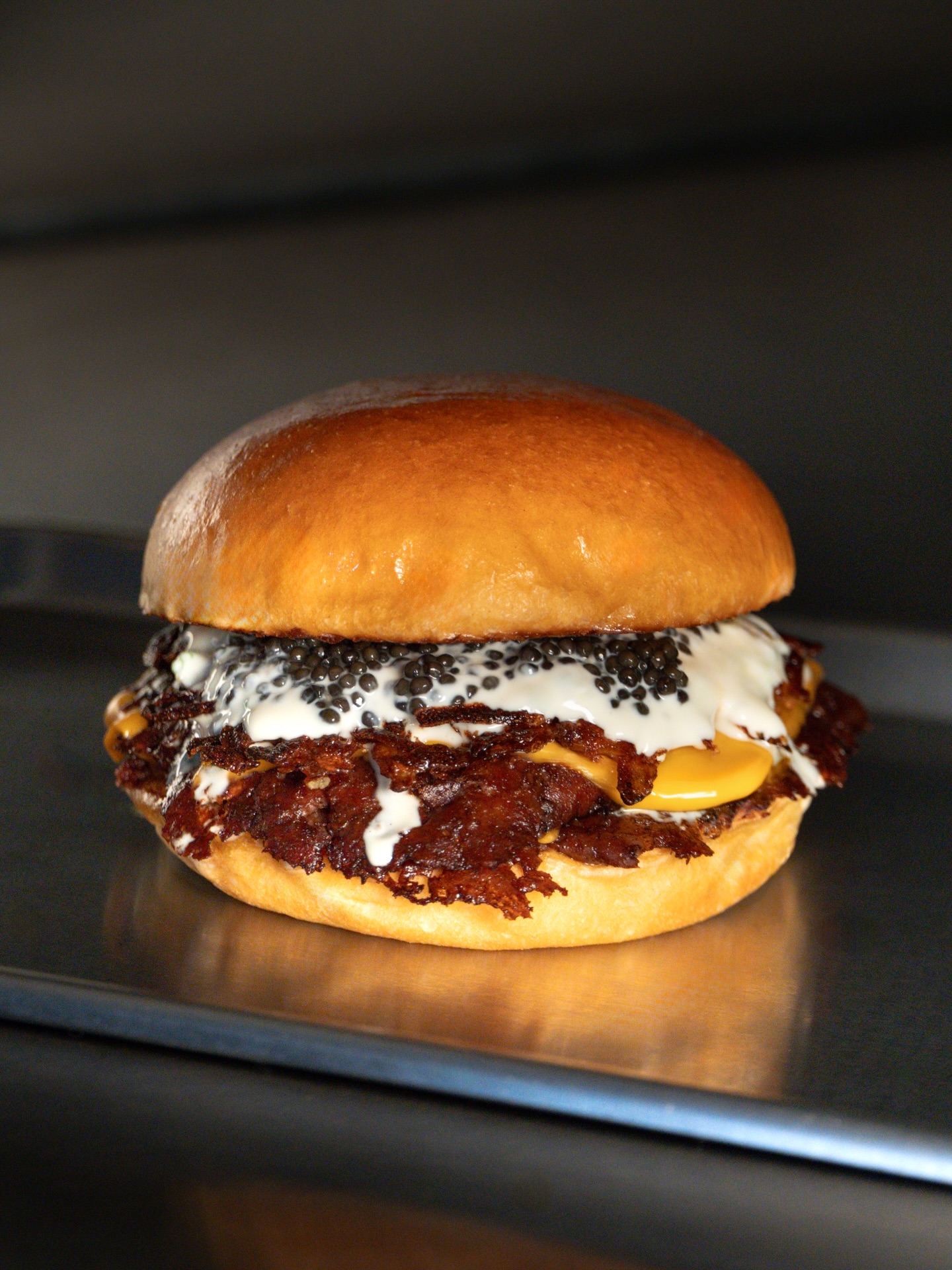 The Caviar Burger 🍔 

Available until January 5th, in selected locations.

Double beef patties and American cheese, topped with a hashbrown, crème fraîche & lemon, and Caviar. 🥄

📍 London & Dubai
Available in all locations.

📍 Paris — available in selected locations:
• Beaugrenelle
• Legendre
• Montmartre
• Saint-Germain
• Sèvres

#caviar #smashburger #junksmashburger #caviarburger